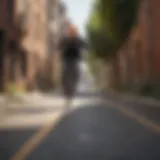 Adam Savage riding Onewheel through urban landscape