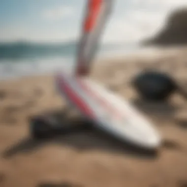 Windsurfing gear laid out on a picturesque beach