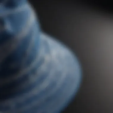 Close-up of the fabric design of a blue bandana bucket hat