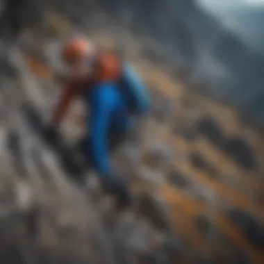 Athlete wearing blue tech fleece climbing a steep mountain