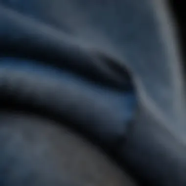 Close-up of blue tech fleece material showcasing durability and flexibility