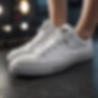 Close-up of white Chuck sneakers with metallic accents