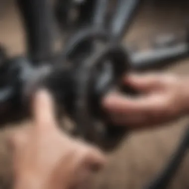 Close-up of cyclist adjusting bike gears