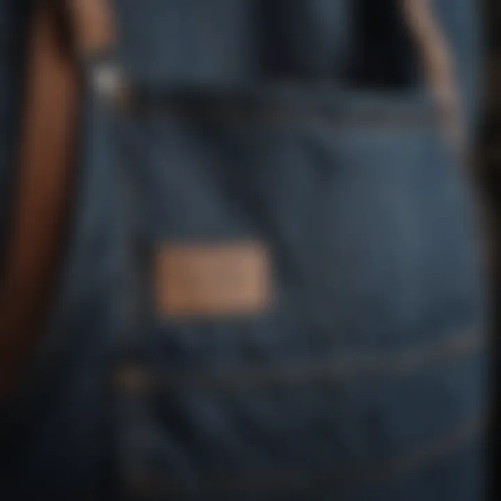 Close-up of denim bib pocket detailing