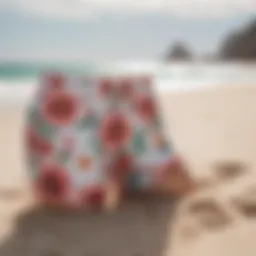 Elegant Floral Board Shorts on White Sand Beach
