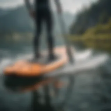 Motorized SUP Board in Action Close-up of a motorized SUP board on water