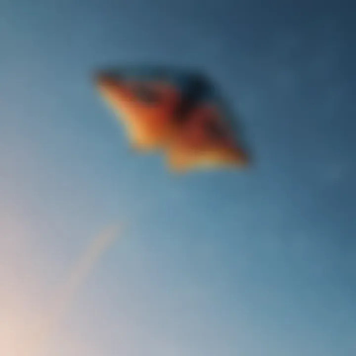 Close-up of a kite soaring high in the vibrant blue sky