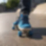 Dynamic blue skate shoes on a concrete skate park