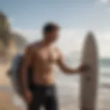 Surfer utilizing portable shower on beach