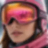 Close-up view of pink reflective ski goggles showcasing lens technology