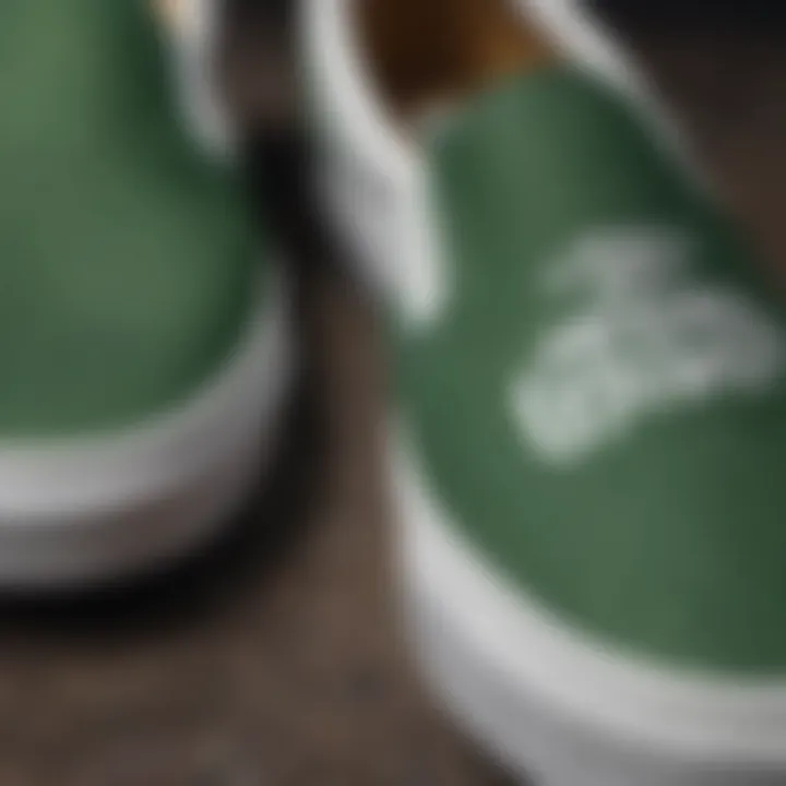 A close-up of green and white slip-on Vans showcasing their unique design and texture.