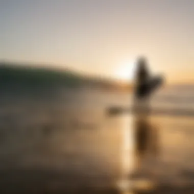 Sunset silhouette of a surfer at Pacific Beach Surfline