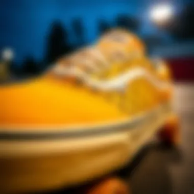 Close-up of yellow checkerboard Vans on a skateboard
