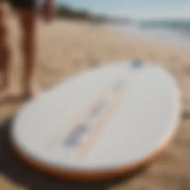 Close-up of skim board gear arranged on the beach