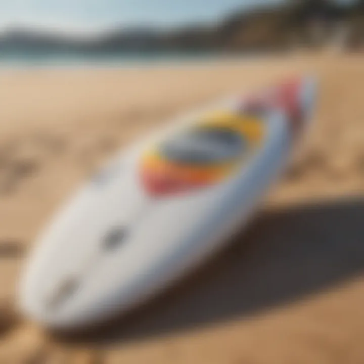 A stylish surfboard adorned with designer logos on the beach