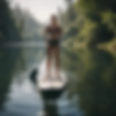 A serene lake scene with a fold up paddleboard in use