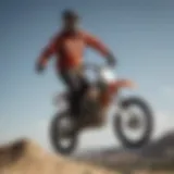 Rider performing a gravity-defying trick on FMX airbag landing