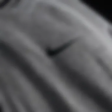 Close-up of high-quality fabric used in grey Nike crewneck