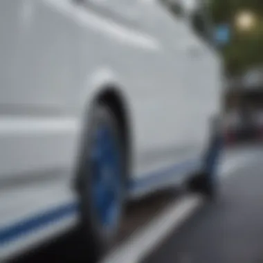 Close-up of the intricate blue stripe detailing on a pristine white van