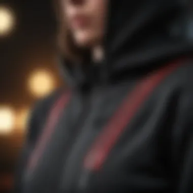 Close-up of intricate zipper details on black hoodie