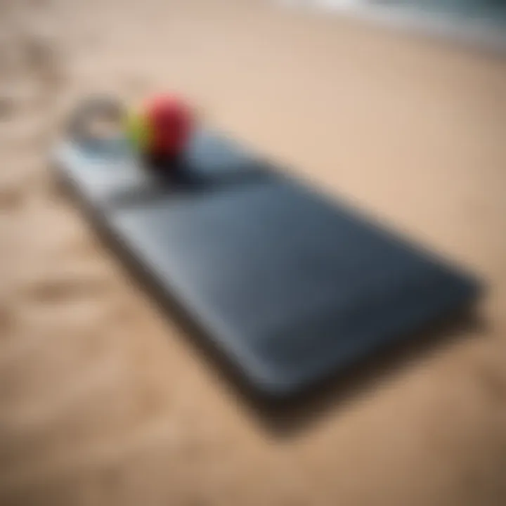 Jet boogie boarding equipment laid out on a sandy beach