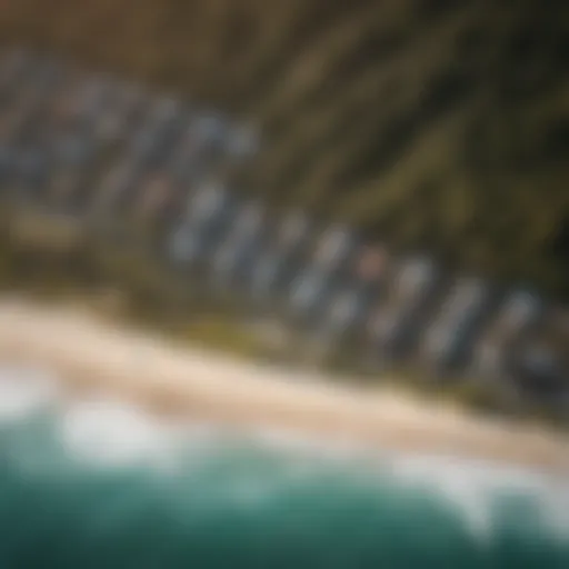 An aerial view of the Kelly Slater Surf Camp showcasing the pristine coastline and surf break.