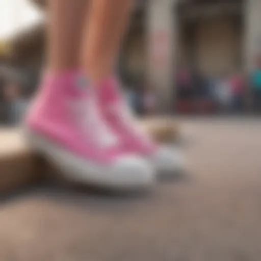 Pink Converse shoes in urban skatepark setting