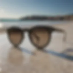 Elegant round black Ray Bans on marble surface