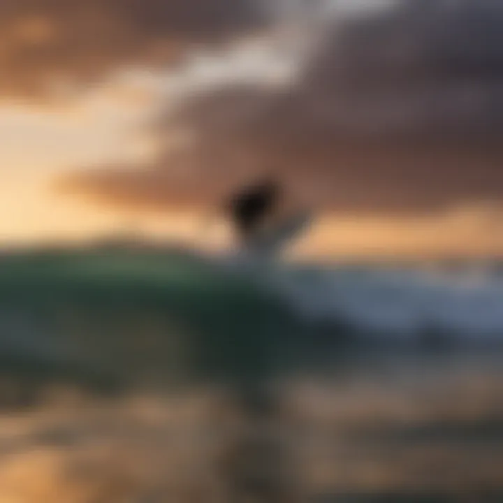 Silhouette of a surfer against the backdrop of a vibrant sky at Surfline Emerald Isle