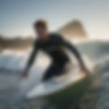 Surfer riding a wave with leash attached