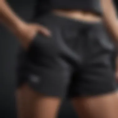 Close-up of soft fabric texture of black sweat shorts highlighting comfort.