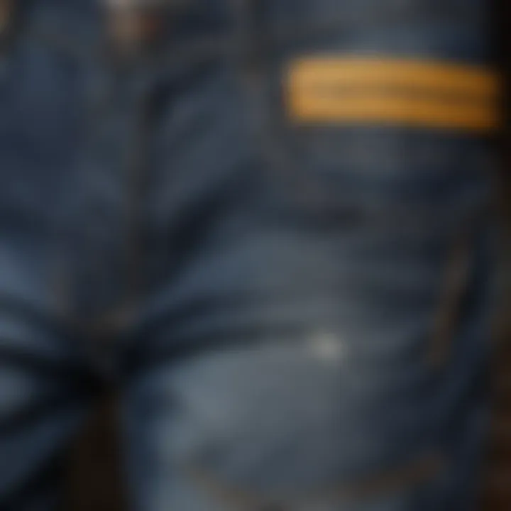 Close-up of intricate stitching details on Tillys baggy jeans