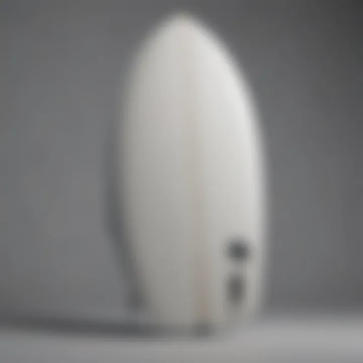 A streamlined twin fin surfboard showcasing Tyler Warren's innovative design.