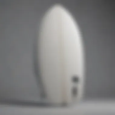 Tyler Warren's Innovative Twin Fin Design A streamlined twin fin surfboard showcasing Tyler Warren's innovative design.