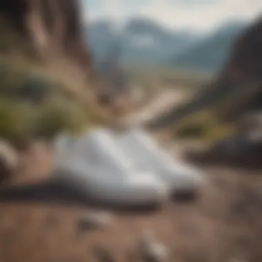 Conquering Terrain: White Suede Vans in Extreme Biking Adventure White suede Vans navigating a rocky mountain trail in extreme biking